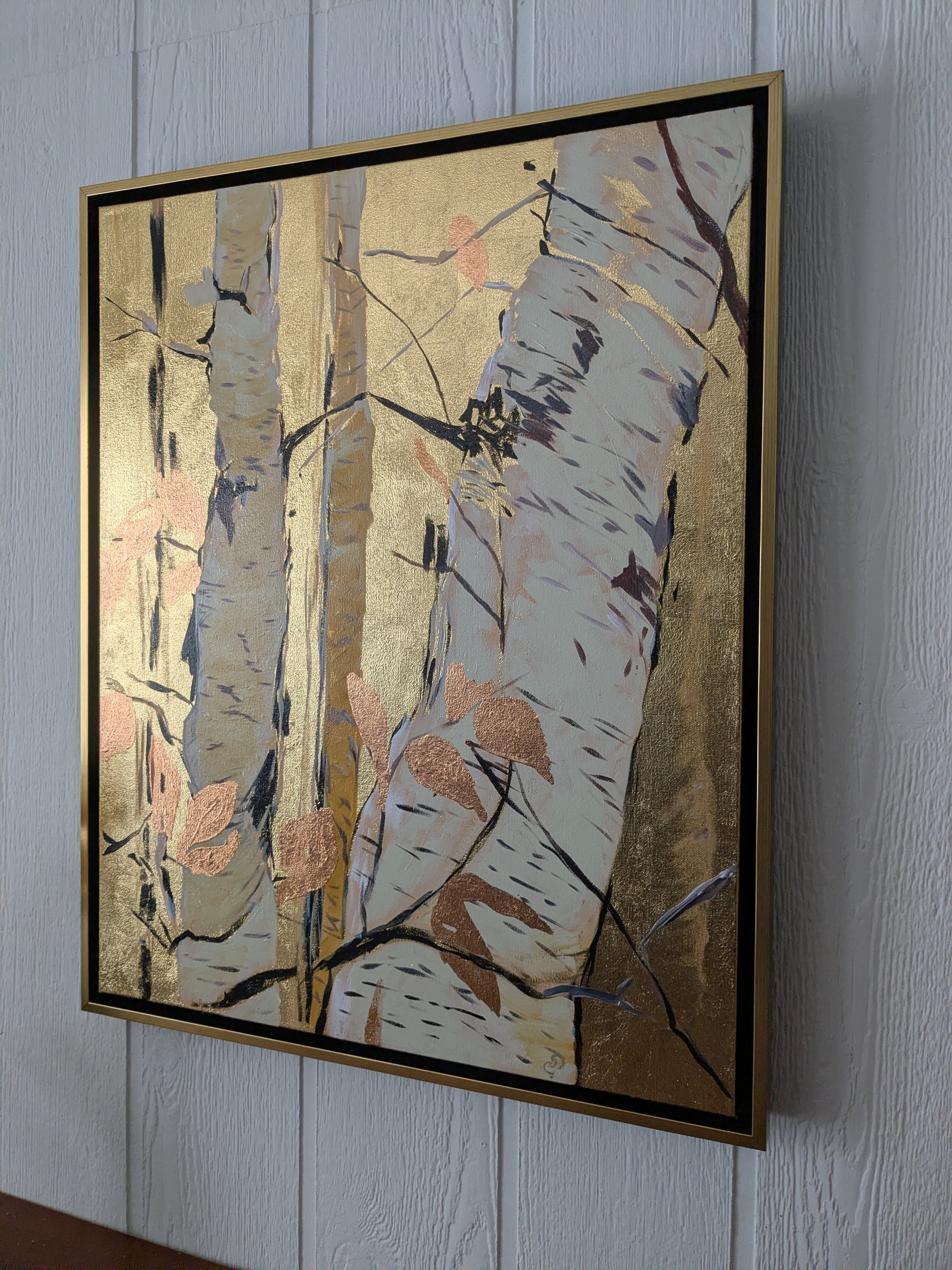 Framed abstract artwork on a wall