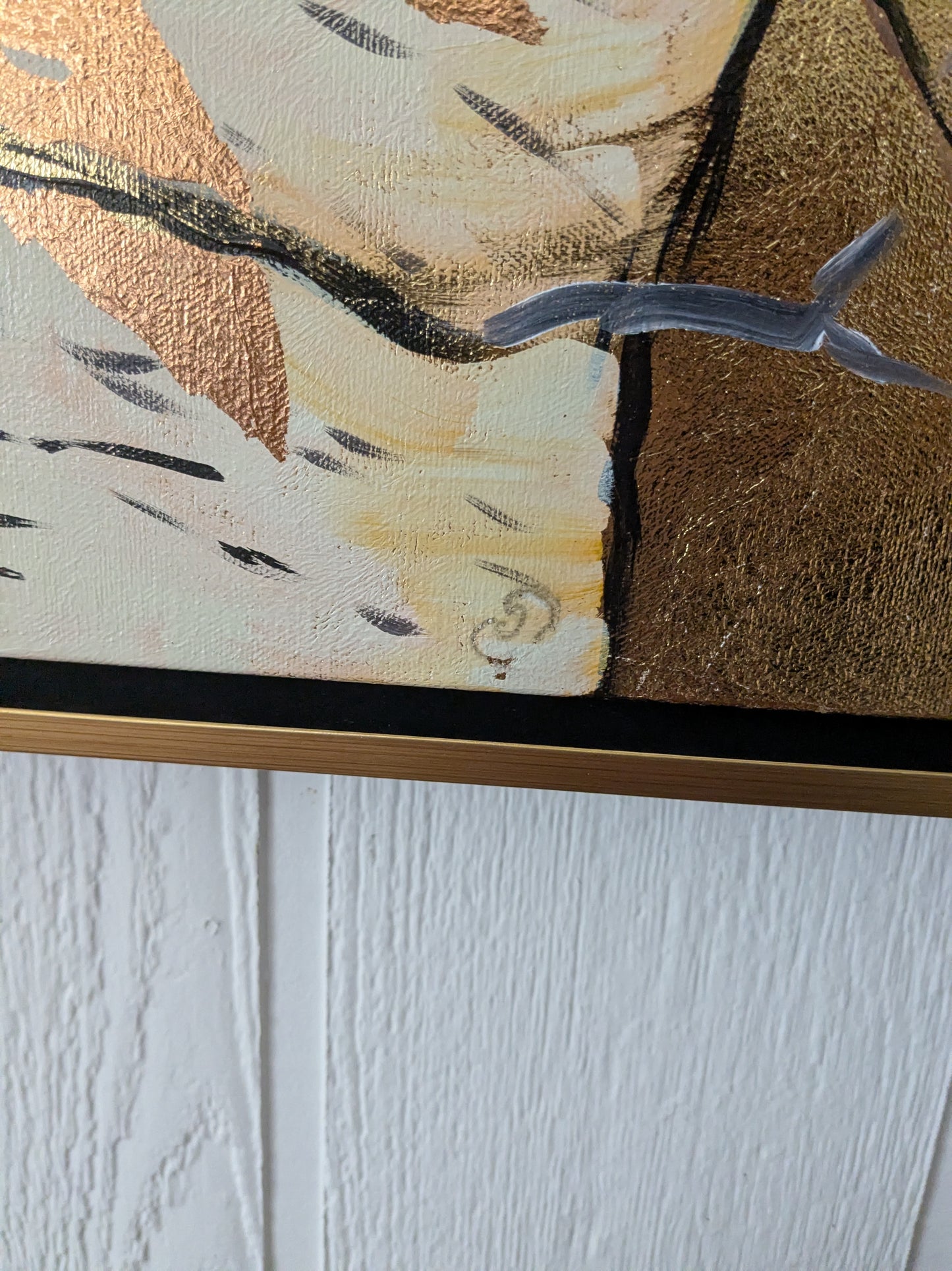 Close-up of signature on abstract design on a white wall