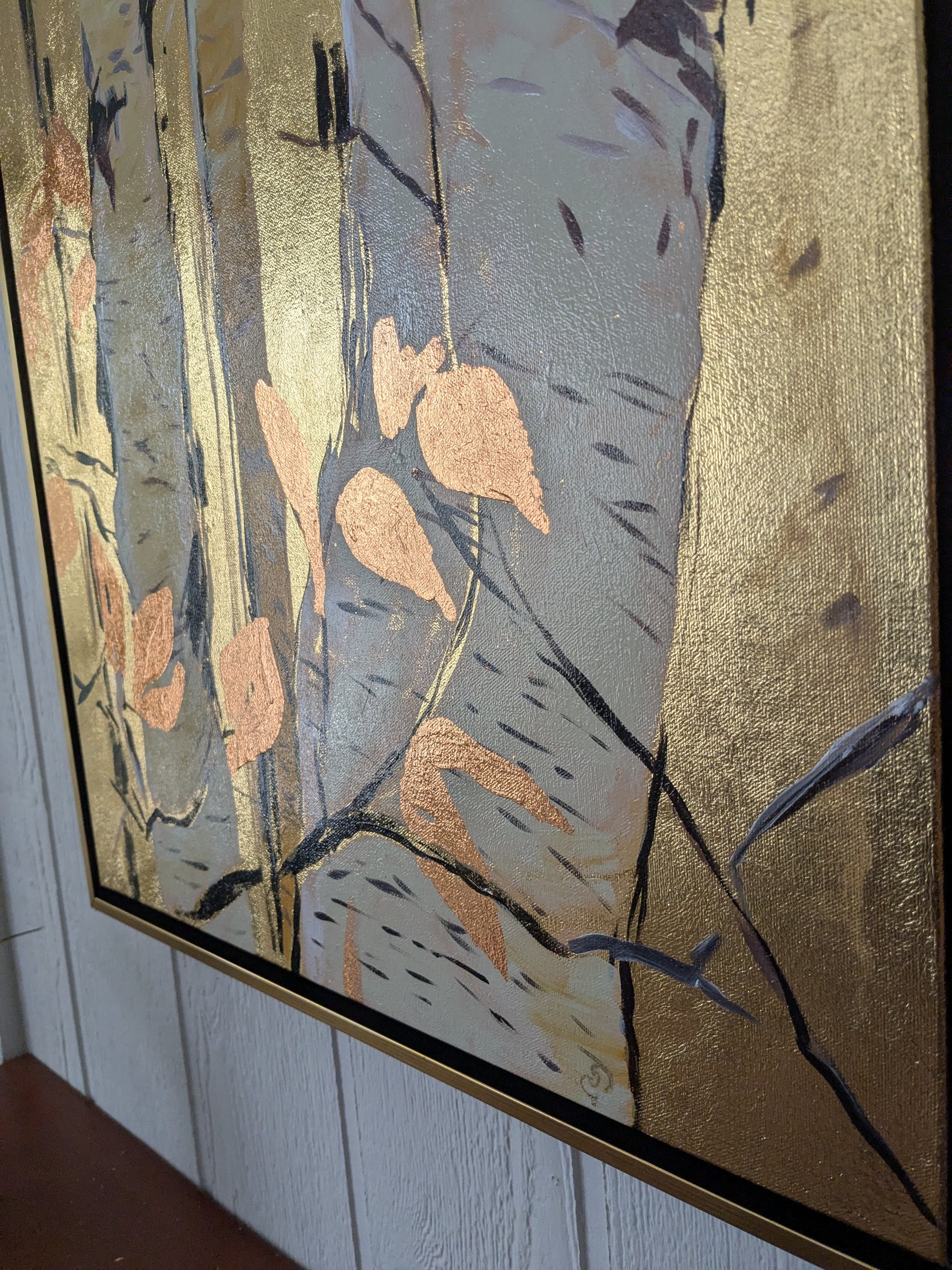 Decorative wall art with abstract design on a white wall